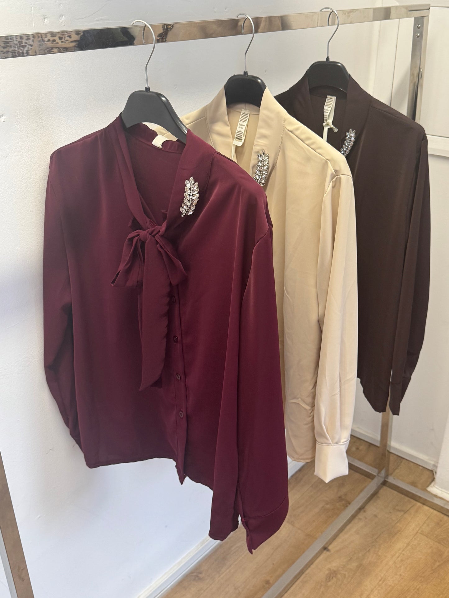 Satin tie neck crystal broach blouse